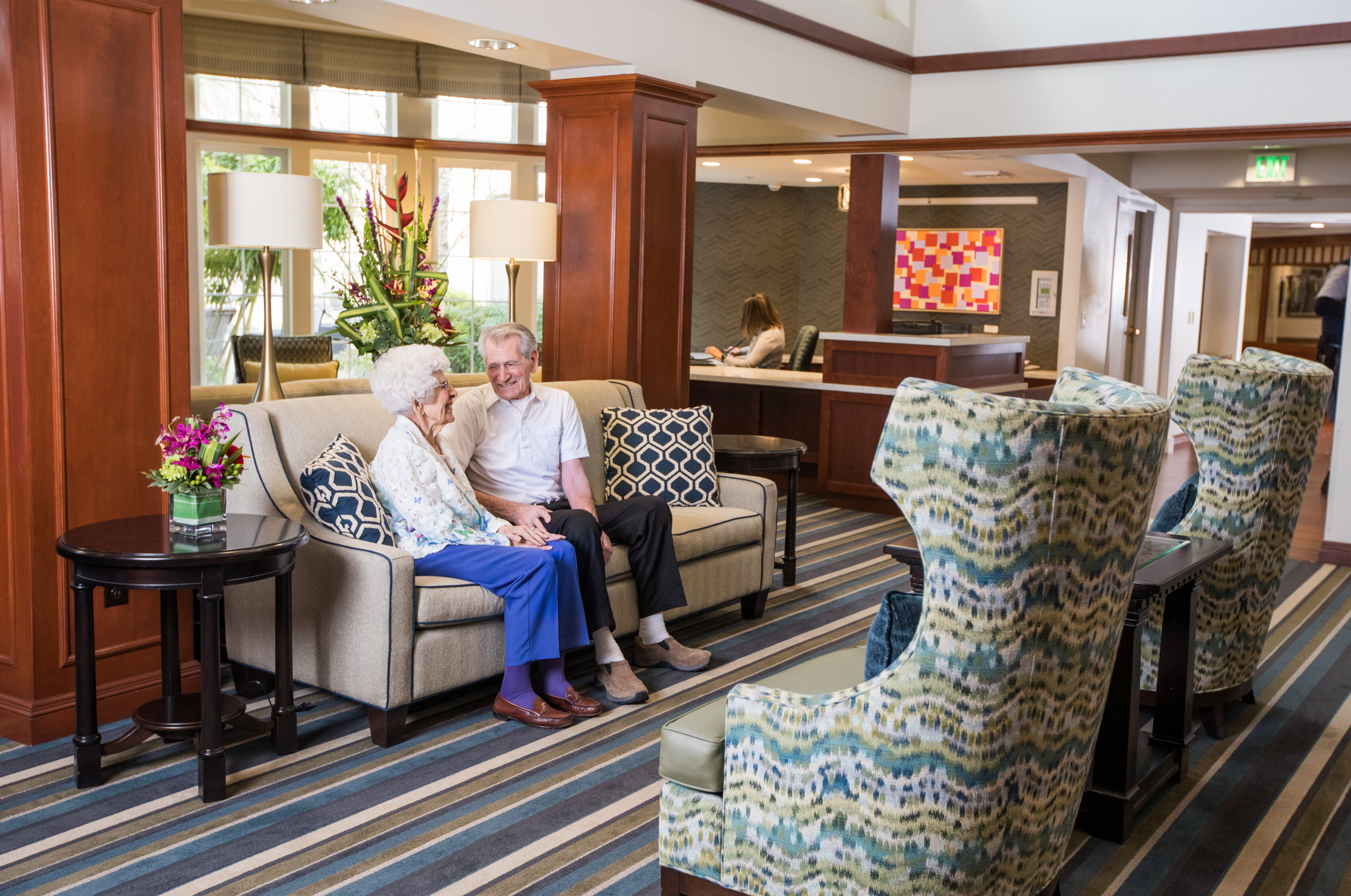 Couple sitting in front lobby