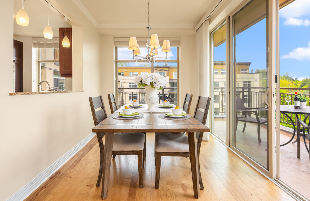 A bright dining room emphasizing indoor/outdoor leisure living at the Aljoya Mercer Island retirement community in Mercer Island.