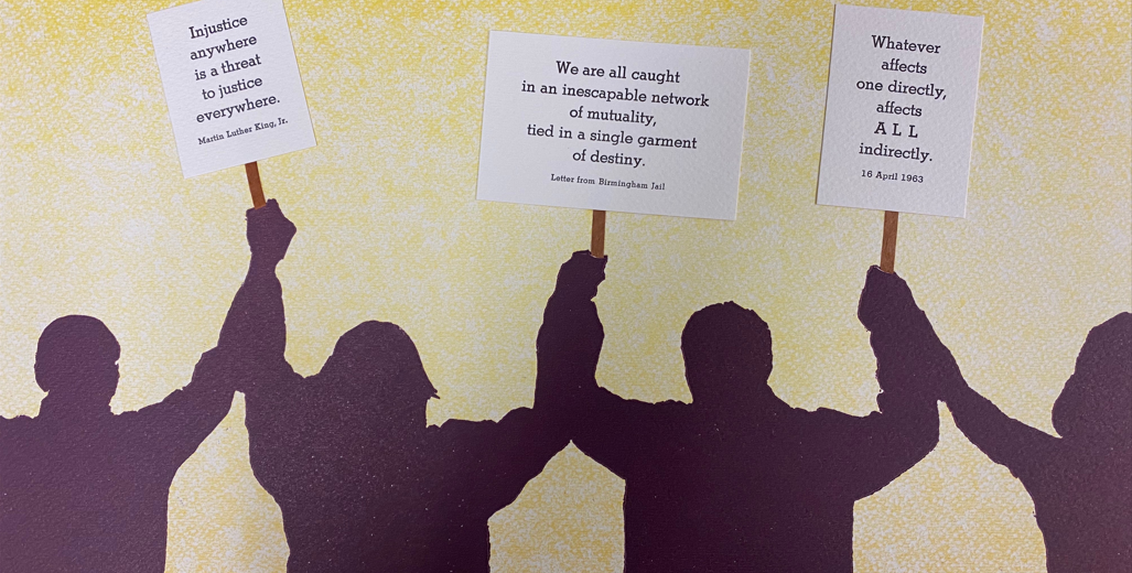 Print of 4 protestors holding signs