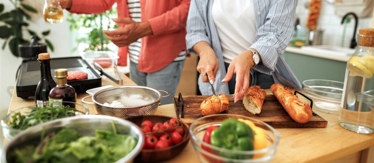 Couple creating a summerttime favorite meal