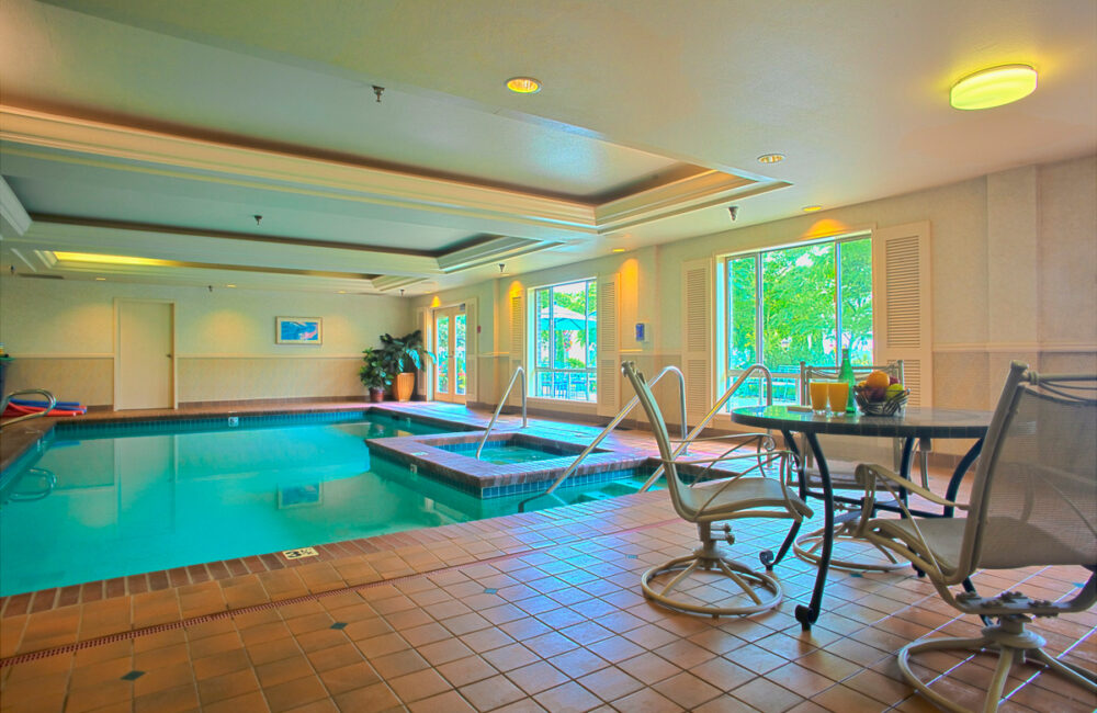Swimming pool in fitness center at premium retirement living community