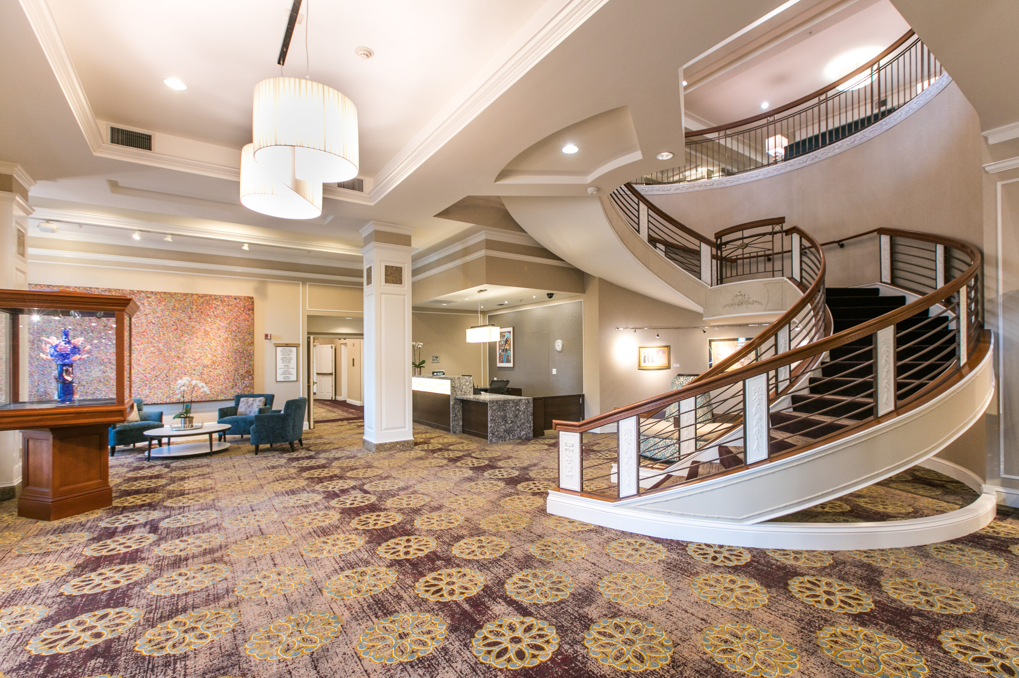 Interior wide-angle lobby shot of University House Wallingford Premier Retirement Living community.